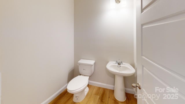 606 Banter Ln Unit 30, Cramerton, NC 28032 - half bath with wood finished floors and toilet