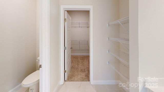 606 Banter Ln Unit 30, Cramerton, NC 28032 - bathroom featuring toilet and a spacious closet