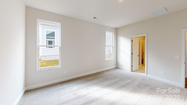 606 Banter Ln Unit 30, Cramerton, NC 28032 - spare room featuring light colored carpet and healthy amount of natural light