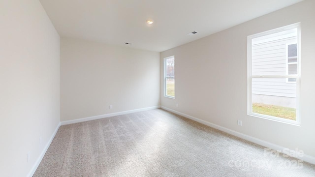 606 Banter Ln Unit 30, Cramerton, NC 28032 - unfurnished room with healthy amount of natural light and light carpet