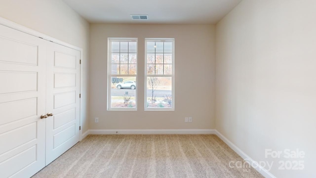 606 Banter Ln Unit 30, Cramerton, NC 28032 - unfurnished bedroom with light carpet and a closet