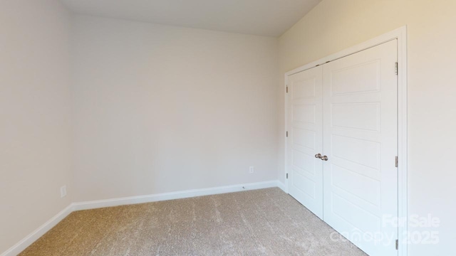 606 Banter Ln Unit 30, Cramerton, NC 28032 - unfurnished bedroom with carpet and a closet