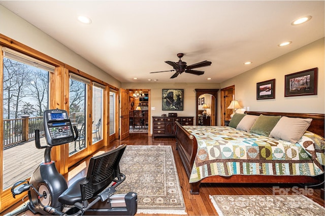 bedroom featuring access to outside, a ceiling fan, wood finished floors, and recessed lighting