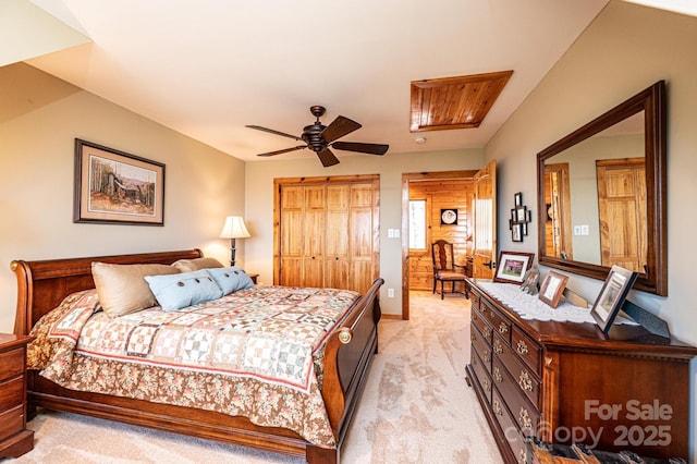 bedroom featuring light carpet