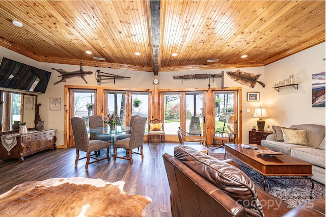 living room featuring plenty of natural light, wooden ceiling, ornamental molding, and dark wood finished floors