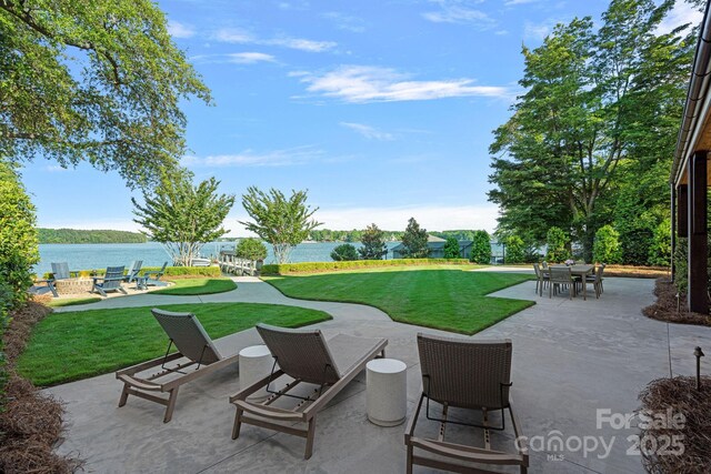 7861 Live Oaks Dr, Denver, NC 28037 - view of patio with a water view and outdoor dining area