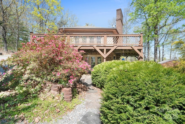 3190 Holly Rd, Connelly Springs, NC 28612 - rear view of house with a wooden deck and a chimney