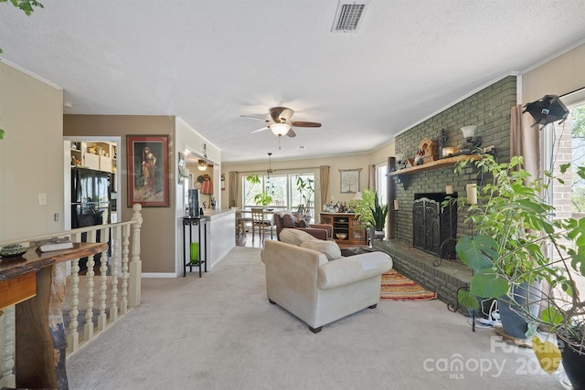 3190 Holly Rd, Connelly Springs, NC 28612 - living area with a fireplace, carpet, a ceiling fan, and a textured ceiling