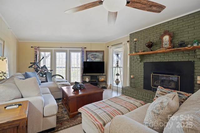 3190 Holly Rd, Connelly Springs, NC 28612 - living area with wood finished floors, crown molding, a ceiling fan, and a fireplace