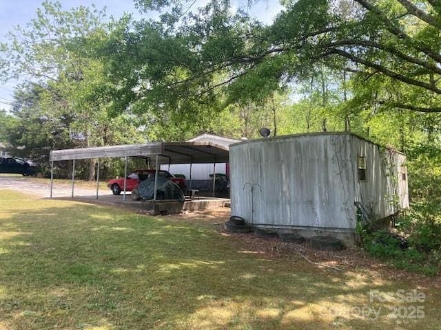 314 Phillips Dr, Forest City, NC 28043 - view of outdoor structure featuring a carport