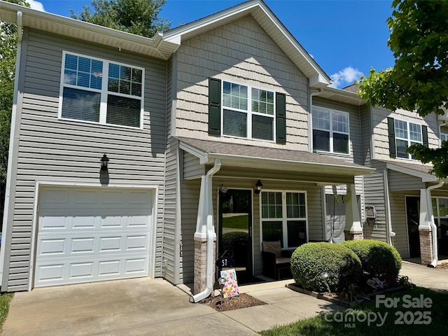 57 Sunny Meadows Blvd, Arden, NC 28704 - view of front of property with a garage, covered porch, and driveway