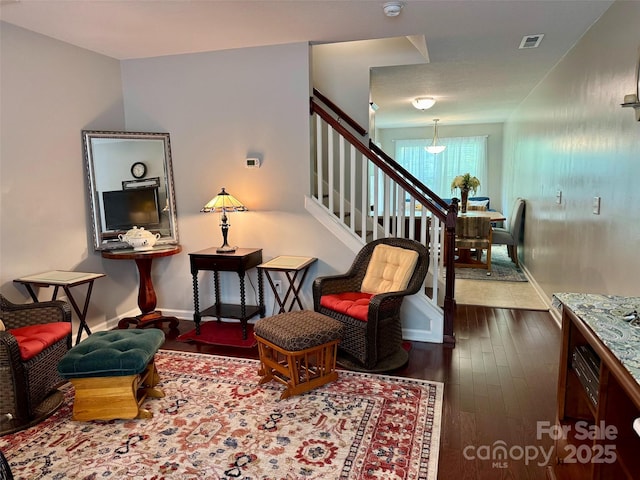 57 Sunny Meadows Blvd, Arden, NC 28704 - living area featuring hardwood / wood-style flooring, stairs, baseboards, and visible vents