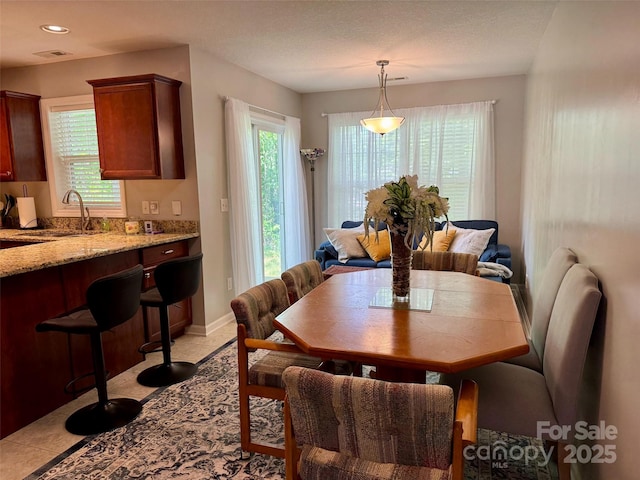 57 Sunny Meadows Blvd, Arden, NC 28704 - dining space with visible vents, baseboards, light tile patterned flooring, and recessed lighting
