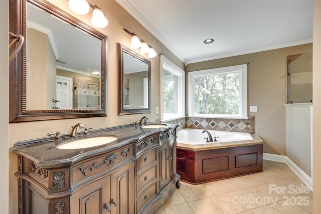 bathroom featuring a sink, tiled shower, tile patterned floors, and a bath