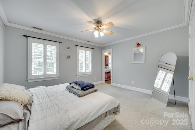 bedroom with visible vents, light carpet, ornamental molding, and multiple windows
