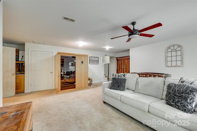 7122 Forest Ridge Rd, Matthews, NC 28104 - living area featuring visible vents, ceiling fan, and light carpet