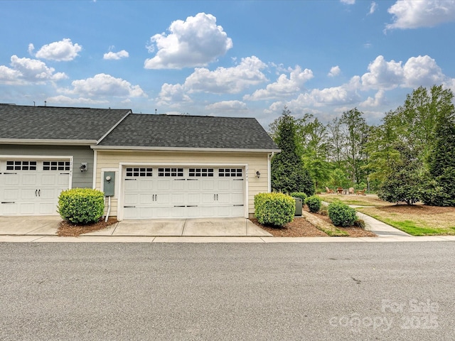 12641 Glowing Peak Rd, Huntersville, NC 28078 - view of front of home featuring a garage, roof with shingles, and driveway