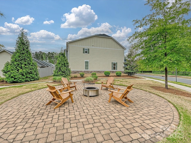 12641 Glowing Peak Rd, Huntersville, NC 28078 - view of patio featuring fence and a fire pit