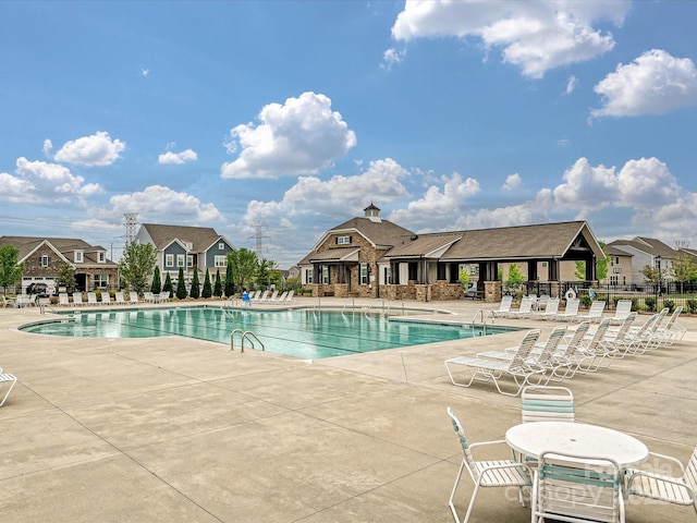 12641 Glowing Peak Rd, Huntersville, NC 28078 - pool featuring a patio and fence