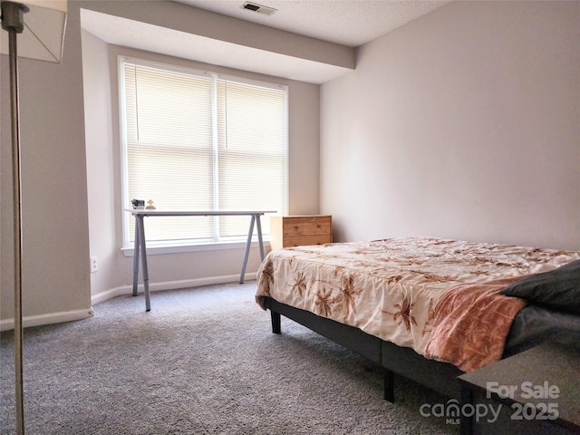 6234 Rosecroft Dr, Charlotte, NC 28215 - carpeted bedroom with baseboards