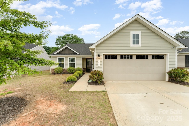 view of front facade with a garage and driveway