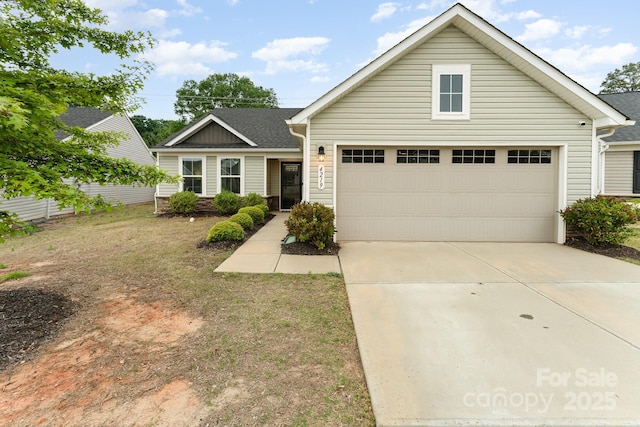 view of front of home with concrete driveway
