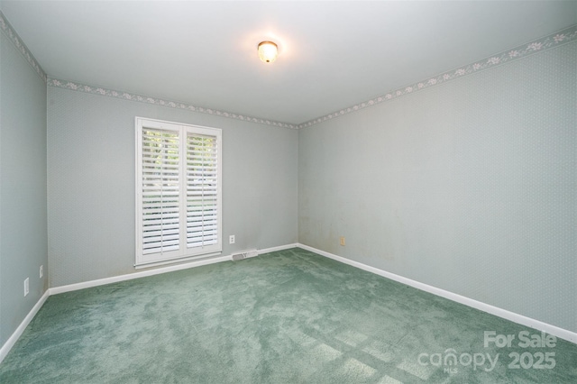 2643 Rolling Hills Dr, Monroe, NC 28110 - carpeted spare room with baseboards and visible vents