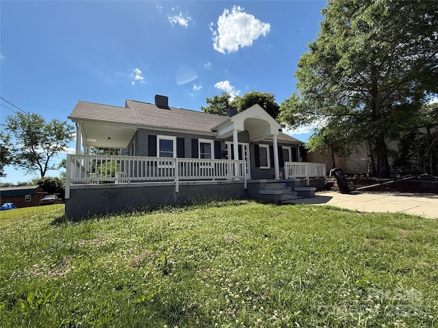 406 S Catawba St, Lancaster, SC 29720 - view of front facade featuring a front yard and a porch