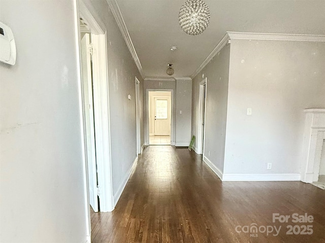 406 S Catawba St, Lancaster, SC 29720 - hallway featuring ornamental molding, wood finished floors, and baseboards