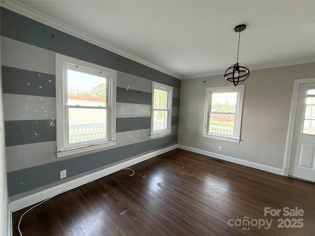 406 S Catawba St, Lancaster, SC 29720 - unfurnished room with wood finished floors, baseboards, crown molding, and a chandelier