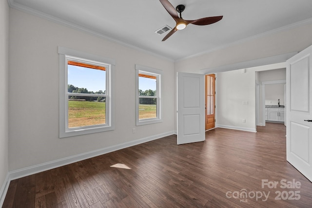 4034 Daugherty Rd, China Grove, NC 28023 - unfurnished bedroom with crown molding, wood finished floors, and a ceiling fan