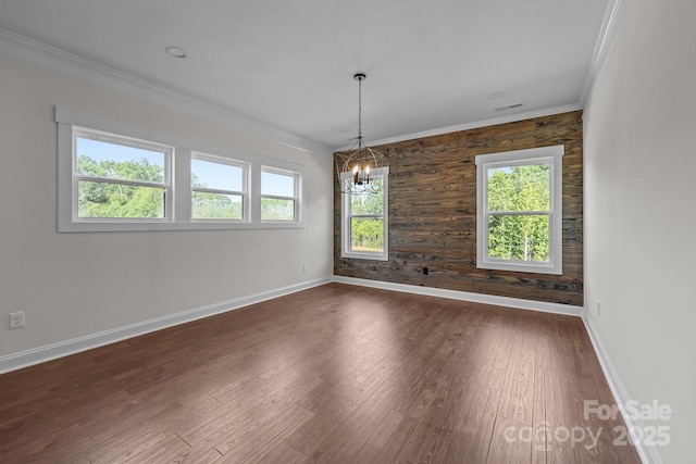 4034 Daugherty Rd, China Grove, NC 28023 - empty room with healthy amount of natural light, a chandelier, dark wood-type flooring, and ornamental molding