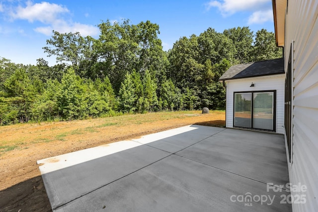 4040 Daugherty Rd, China Grove, NC 28023 - view of patio featuring a forest view