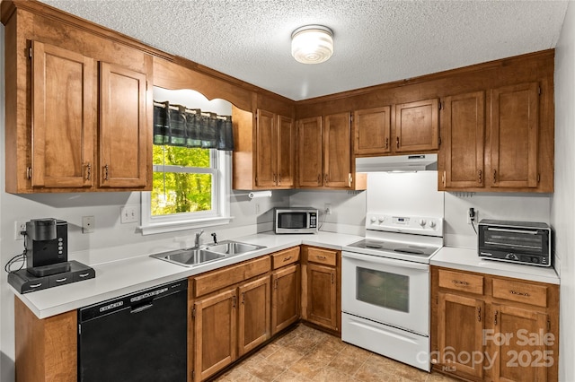 304 W Fourth St, Cherryville, NC 28021 - kitchen featuring a sink, stainless steel microwave, black dishwasher, under cabinet range hood, and electric stove