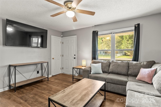 304 W Fourth St, Cherryville, NC 28021 - living room with wood finished floors, a textured ceiling, and a ceiling fan