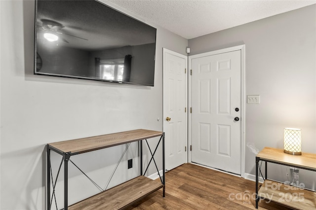304 W Fourth St, Cherryville, NC 28021 - doorway to outside featuring ceiling fan, baseboards, wood finished floors, and a textured ceiling