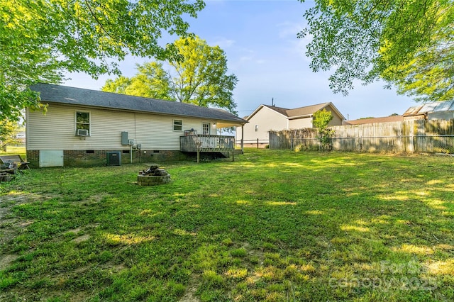 304 W Fourth St, Cherryville, NC 28021 - back of house with a fire pit, fence, a yard, and central AC
