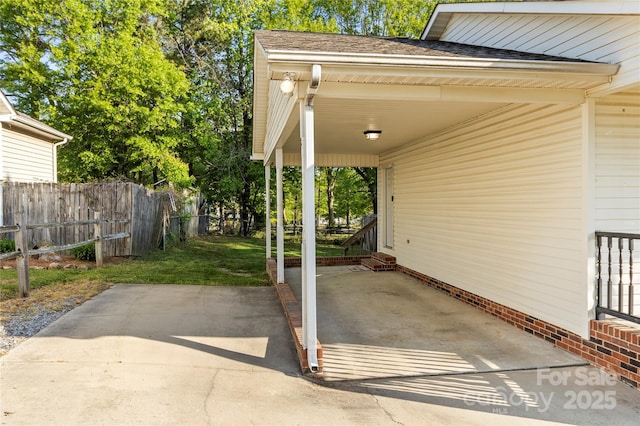 304 W Fourth St, Cherryville, NC 28021 - view of patio featuring fence, a carport, and entry steps