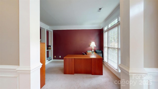 office area with visible vents, light colored carpet, and ornamental molding