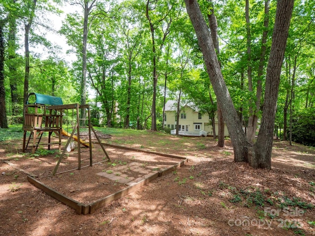 view of yard with a playground