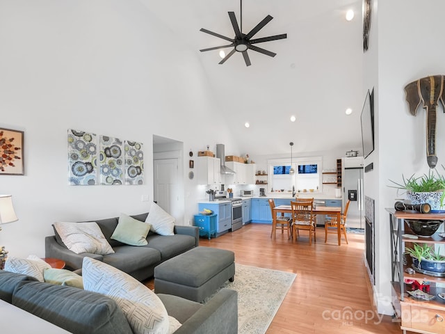 18 Covington St, Asheville, NC 28806 - living area with high vaulted ceiling, a ceiling fan, light wood finished floors, and recessed lighting