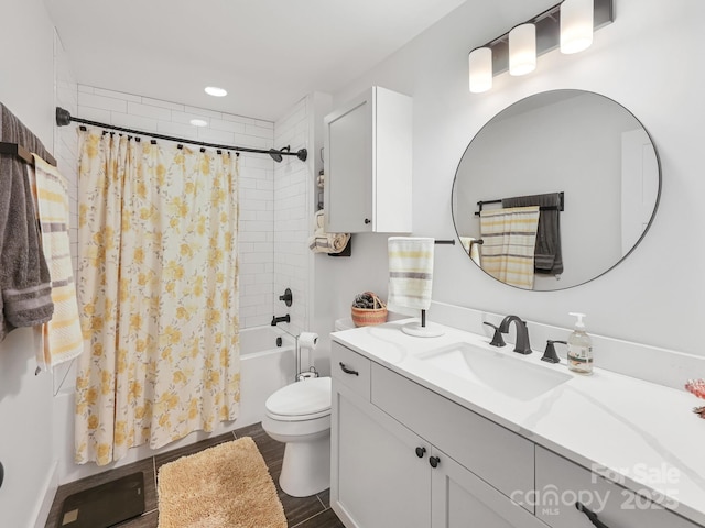 18 Covington St, Asheville, NC 28806 - full bath with wood finished floors, shower / bath combo with shower curtain, toilet, and vanity