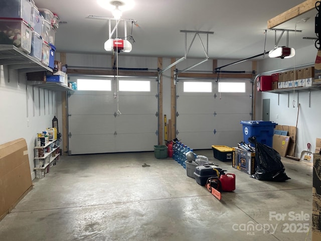 18 Covington St, Asheville, NC 28806 - garage featuring a garage door opener