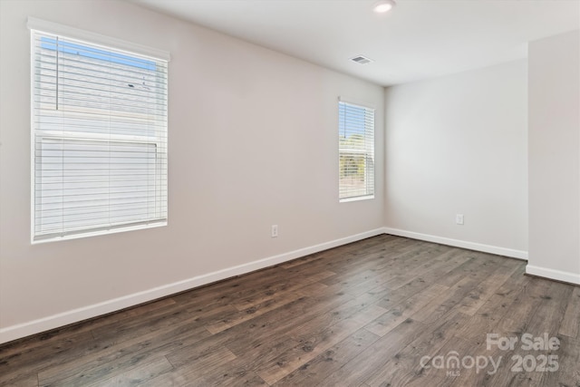 13210 Kenworth Rd, Charlotte, NC 28278 - spare room with wood finished floors and recessed lighting