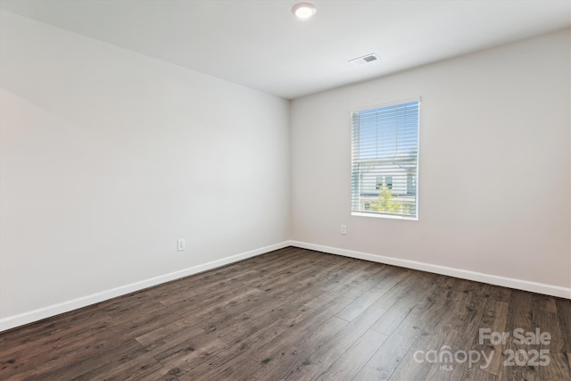 13210 Kenworth Rd, Charlotte, NC 28278 - empty room with dark wood-style floors and baseboards