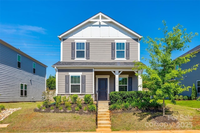 13210 Kenworth Rd, Charlotte, NC 28278 - view of front of home featuring board and batten siding and a front lawn