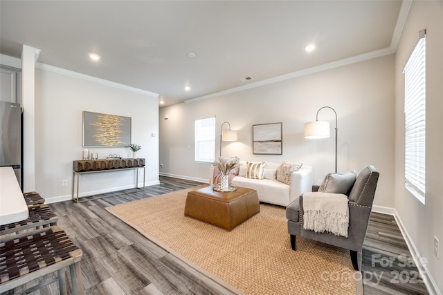 13210 Kenworth Rd, Charlotte, NC 28278 - living area with dark wood finished floors, crown molding, and recessed lighting