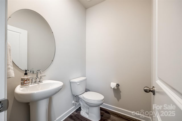 13210 Kenworth Rd, Charlotte, NC 28278 - bathroom with baseboards and wood finished floors
