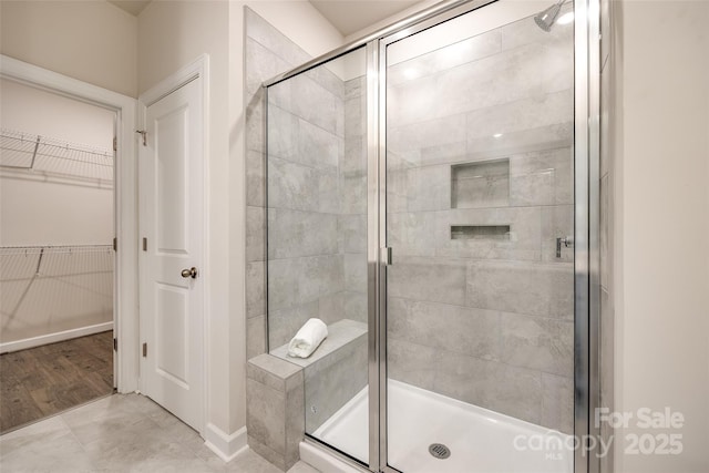13210 Kenworth Rd, Charlotte, NC 28278 - bathroom featuring a shower stall and a walk in closet