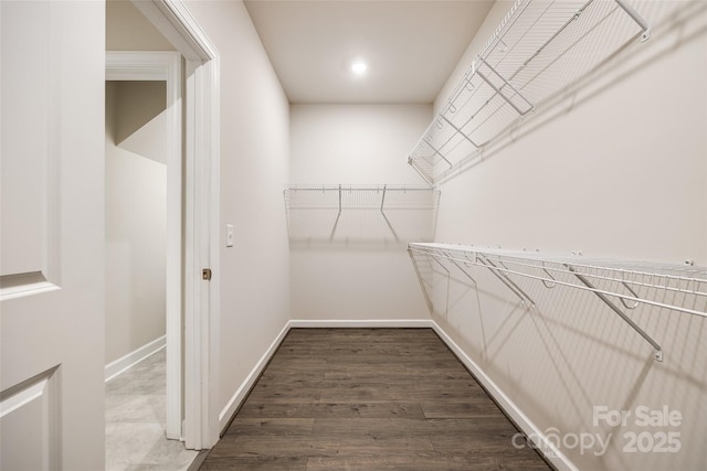 13210 Kenworth Rd, Charlotte, NC 28278 - walk in closet featuring dark wood-style floors